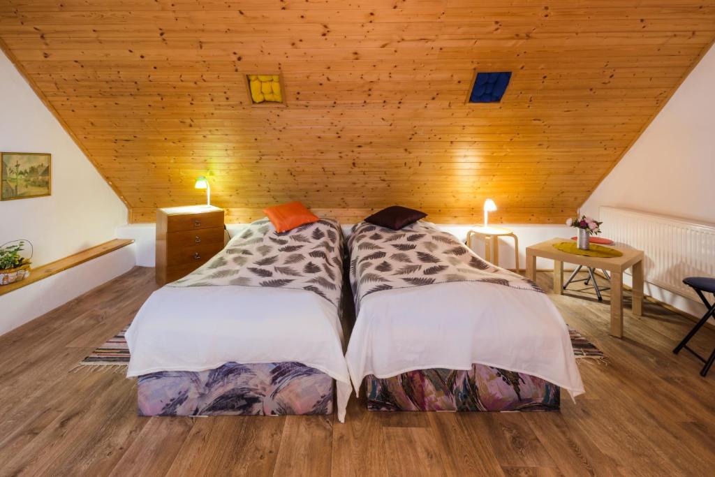 Postel nebo postele na pokoji v ubytování Ubytování Hrusice