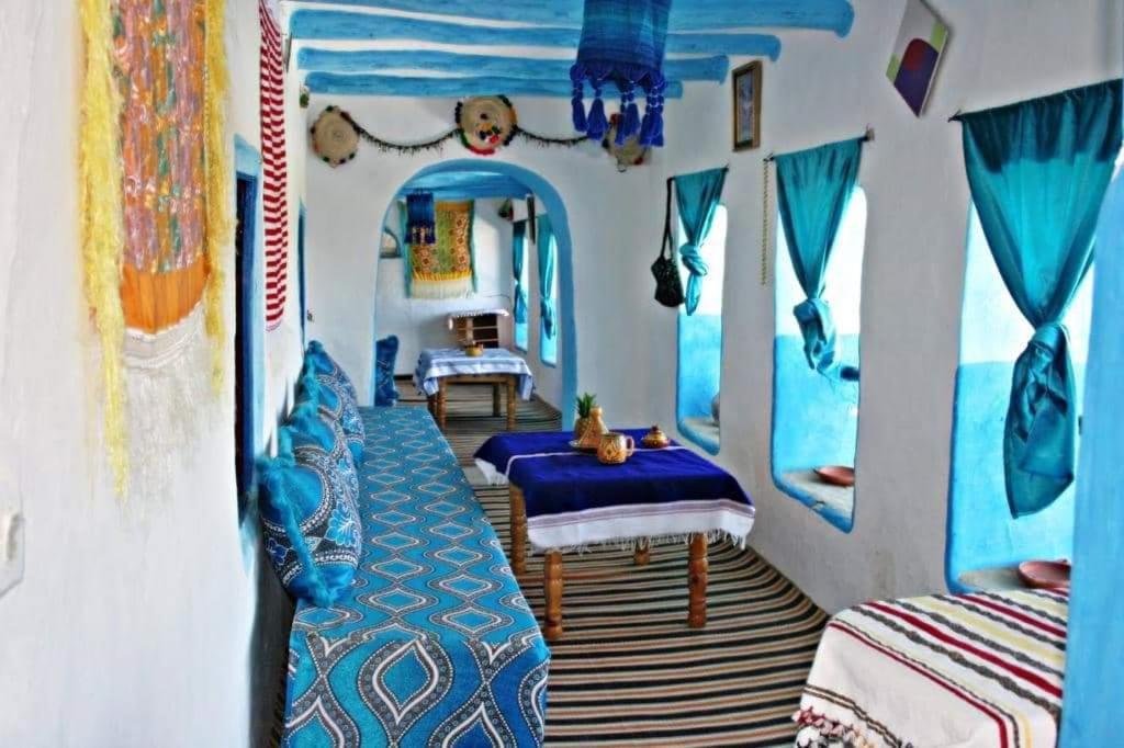 Postel nebo postele na pokoji v ubytování Nefzi Guest House