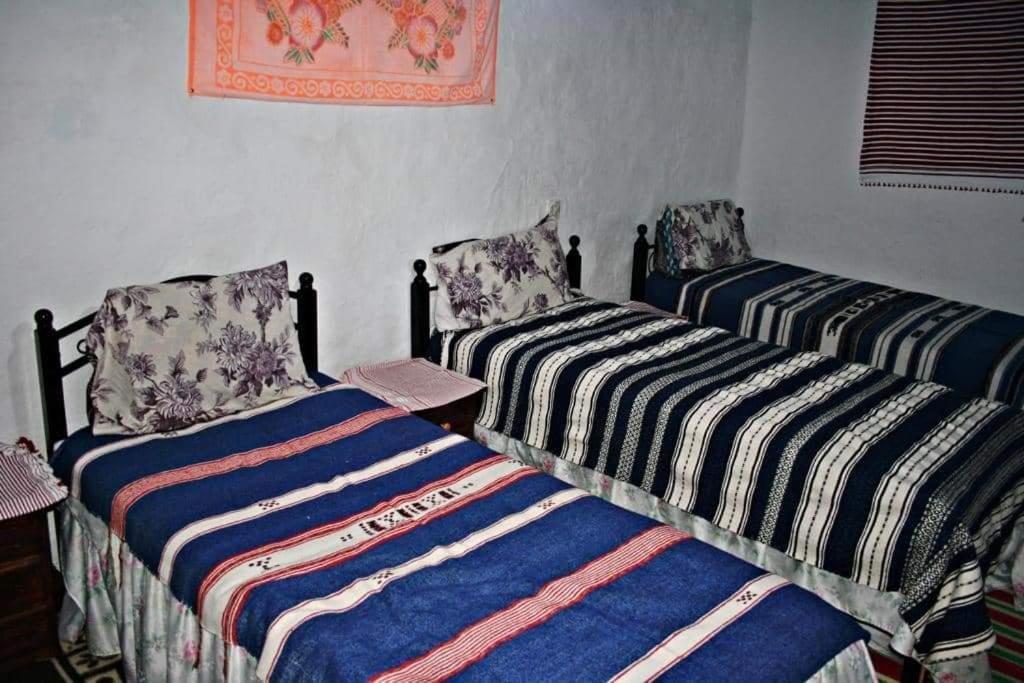Postel nebo postele na pokoji v ubytování Nefzi Guest House