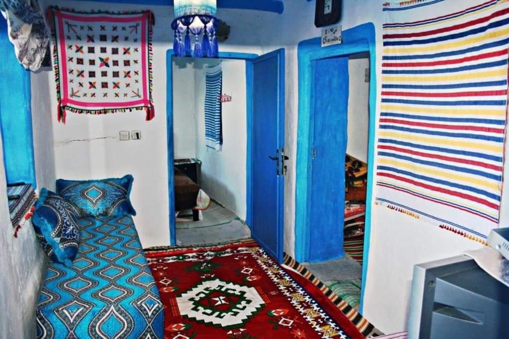 Postel nebo postele na pokoji v ubytování Nefzi Guest House