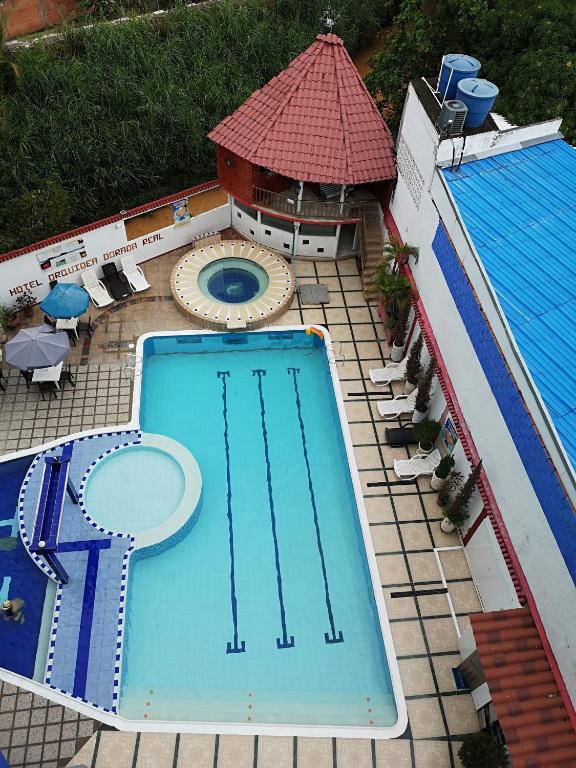 Bazén v ubytování Hotel Orquidea Dorada R nebo v jeho okolí
