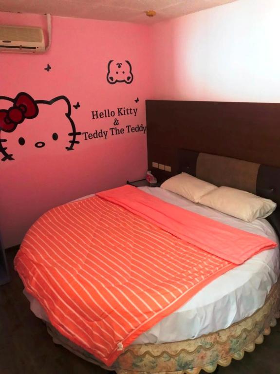 Postel nebo postele na pokoji v ubytování Sheng Feng Homestay