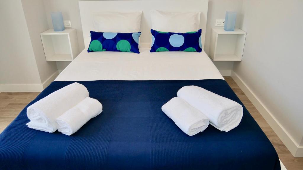 Кровать или кровати в номере Playa Los Álamos, descanso y ocio en Torremolinos