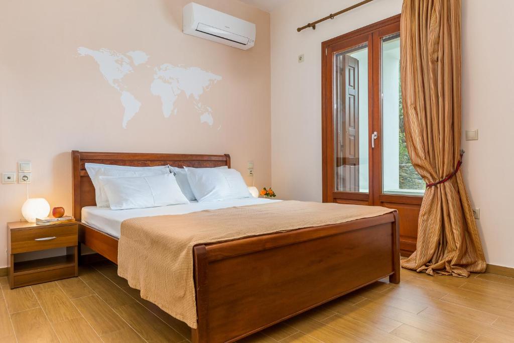 Postel nebo postele na pokoji v ubytování Olive Grove Apartment