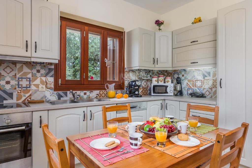 Kuchyň nebo kuchyňský kout v ubytování Olive Grove Apartment