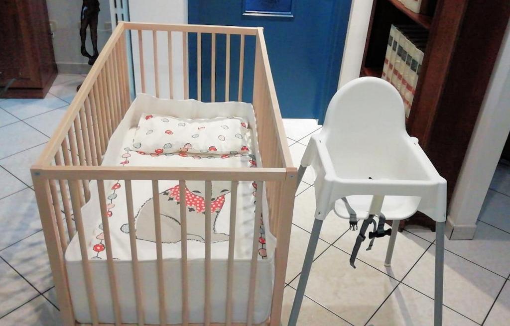 Łóżko lub łóżka w pokoju w obiekcie Comfort House Pisa