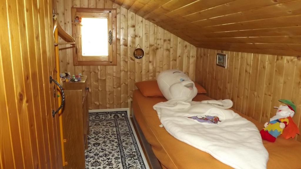 Postel nebo postele na pokoji v ubytování Chalet del frassino