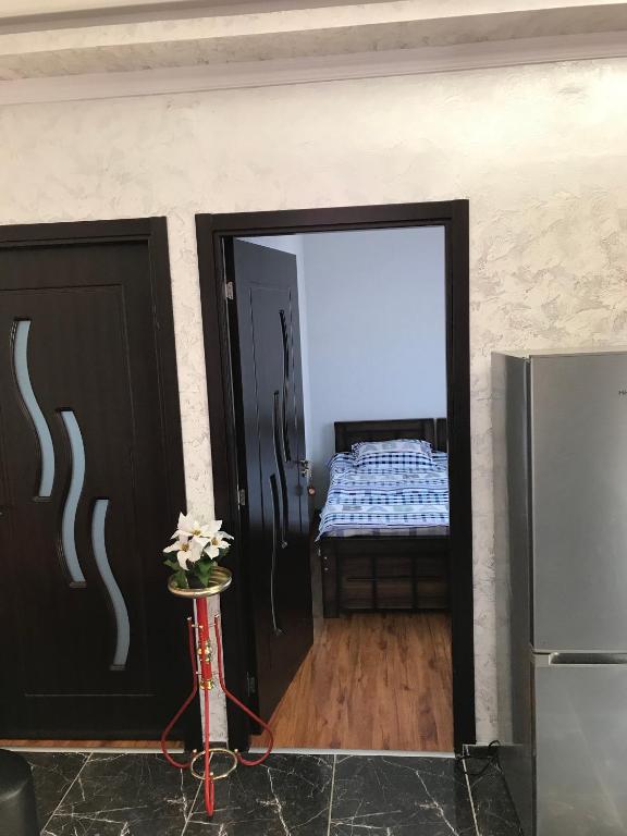 Postel nebo postele na pokoji v ubytování Kobuleti Guest House chexov 24