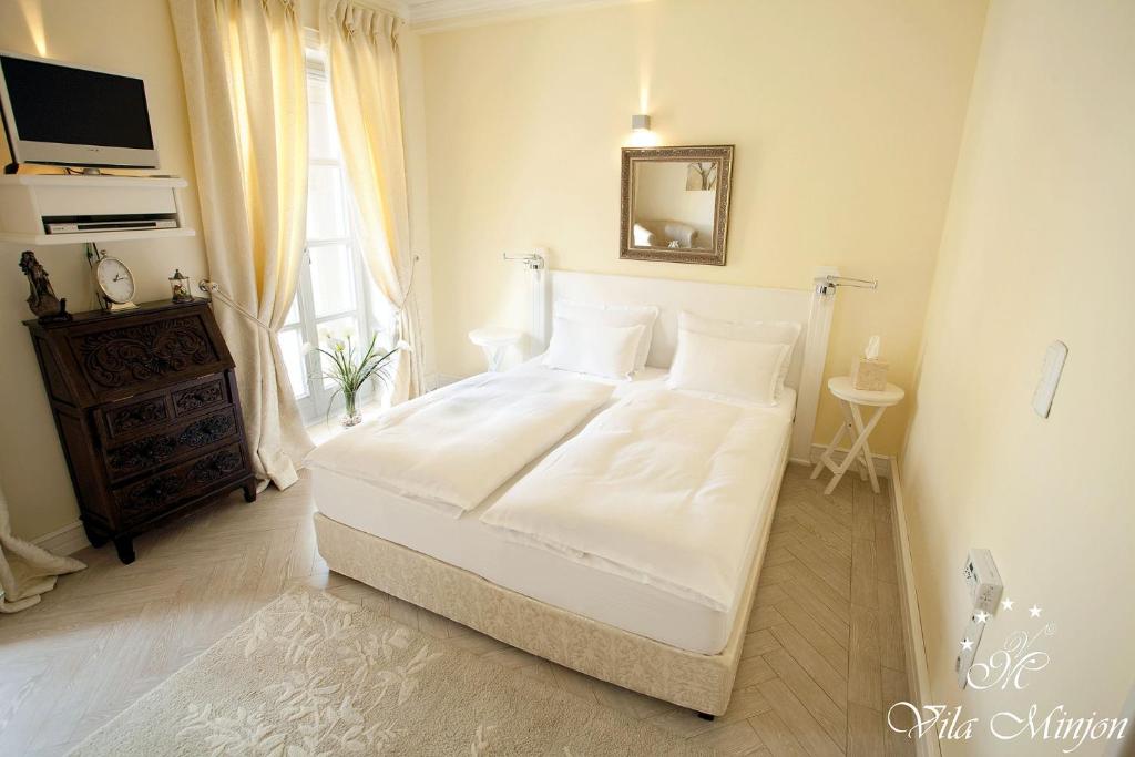 Postel nebo postele na pokoji v ubytování Luxury Rooms Minjon