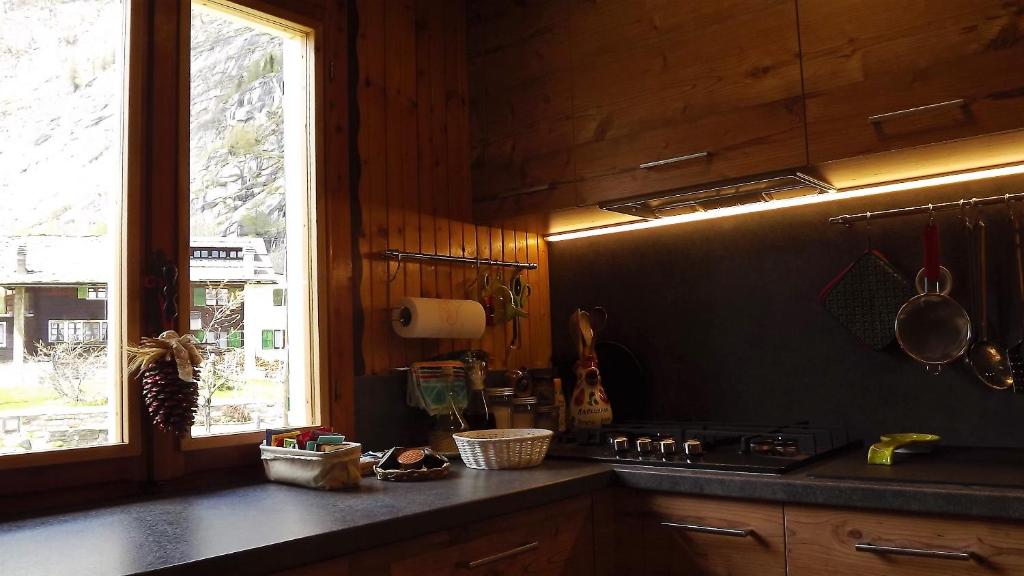 Kuchyň nebo kuchyňský kout v ubytování Chalet del frassino