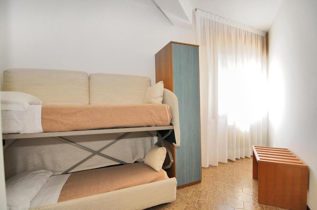 Postel nebo postele na pokoji v ubytování Venus Best Price