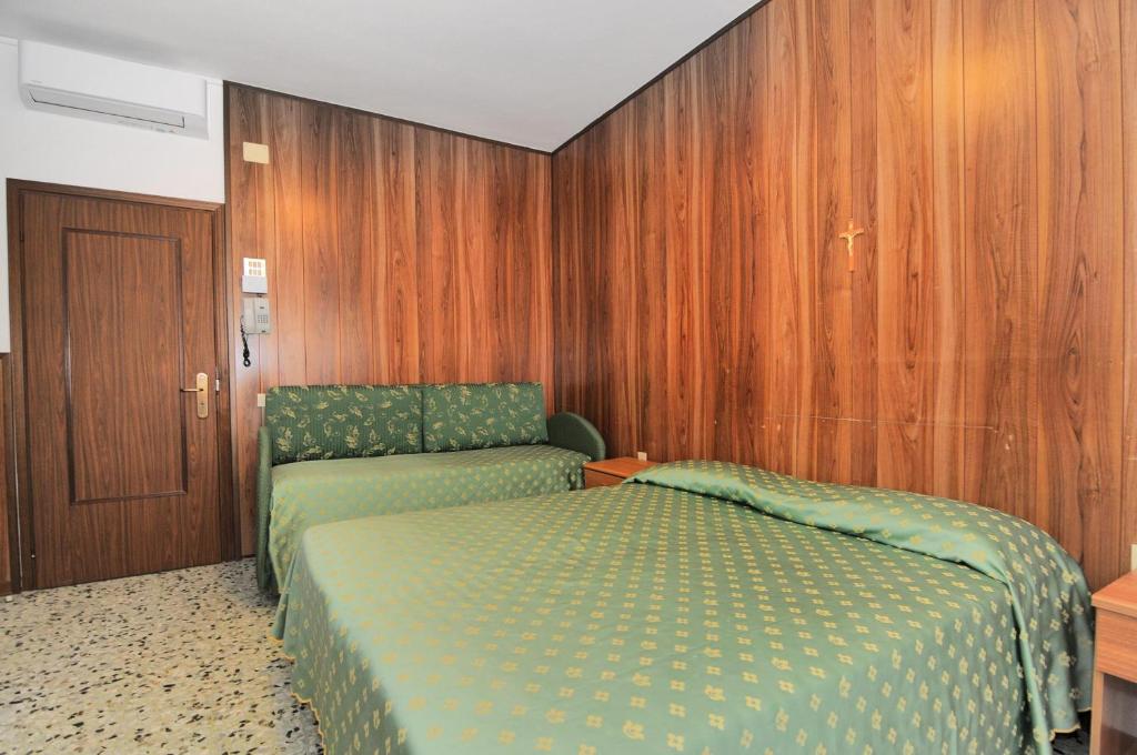 Postel nebo postele na pokoji v ubytování Venus Best Price