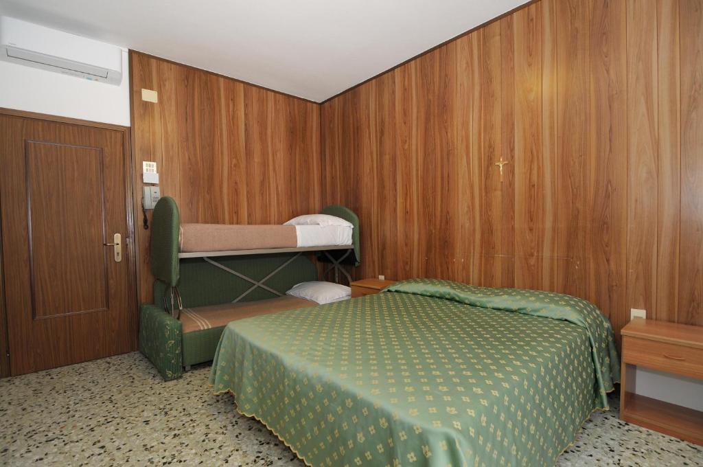 Postel nebo postele na pokoji v ubytování Venus Best Price