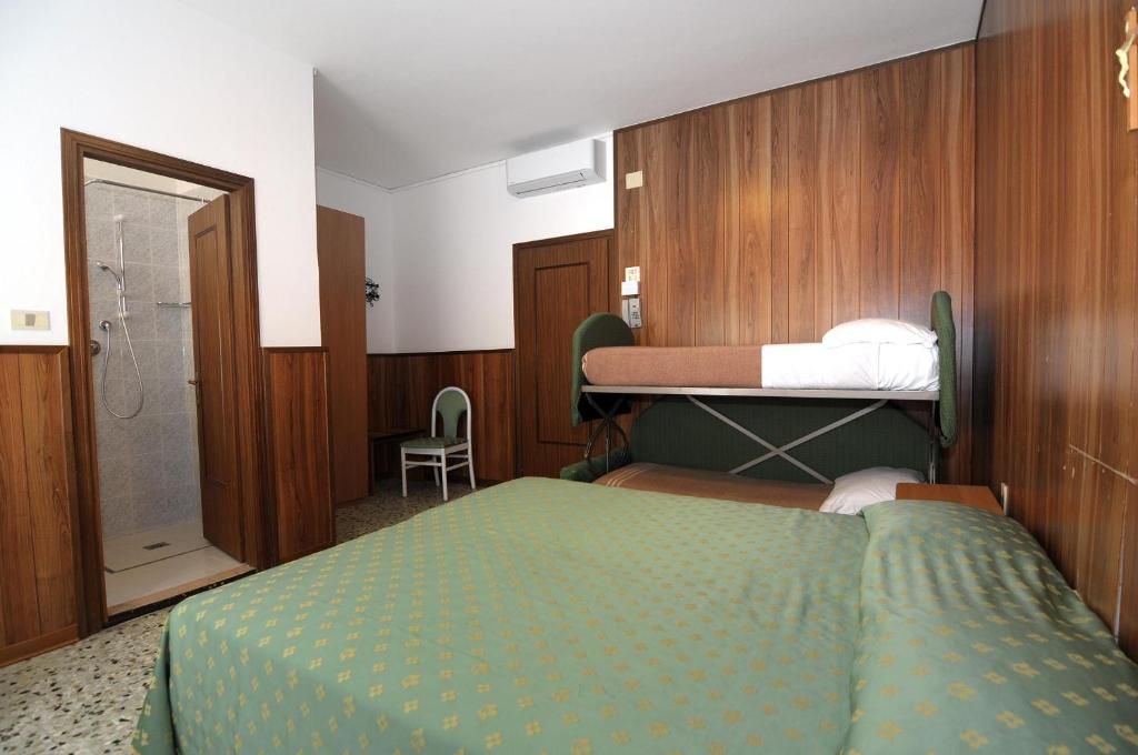 Postel nebo postele na pokoji v ubytování Venus Best Price