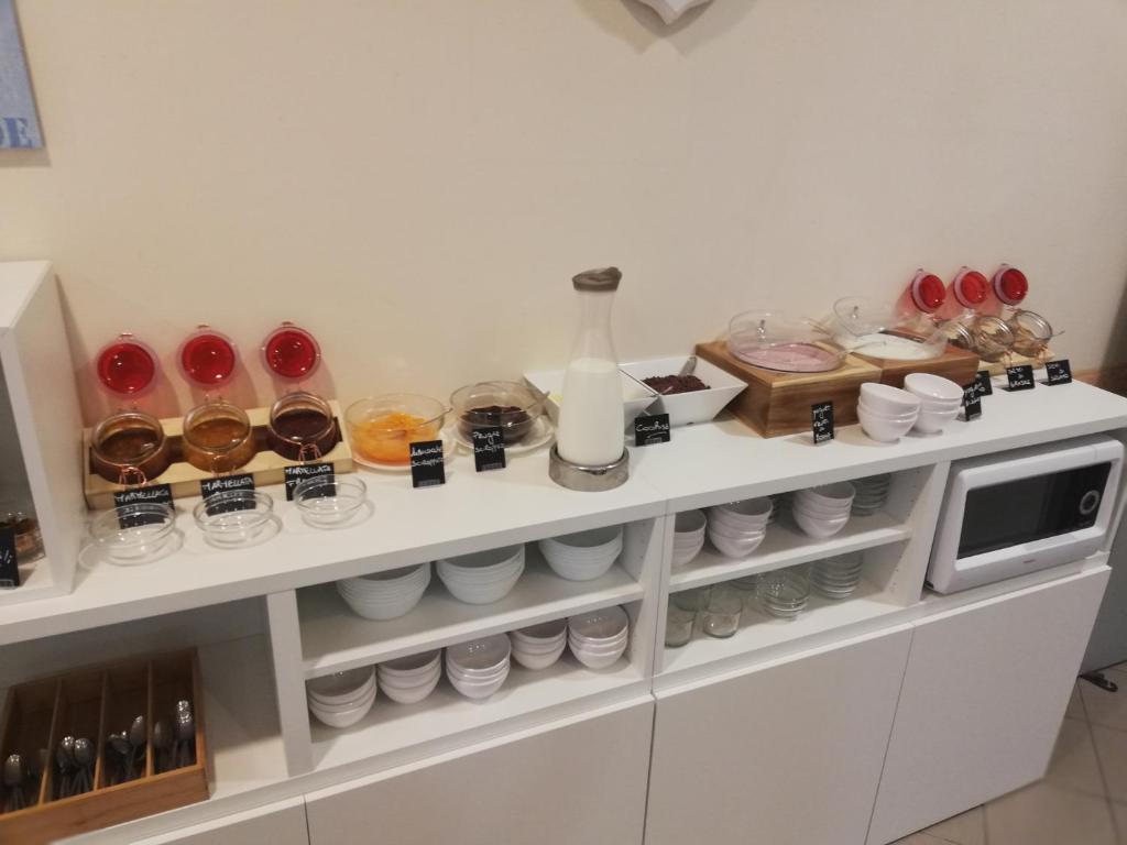 Kuchyň nebo kuchyňský kout v ubytování Hotel 21 Riccione