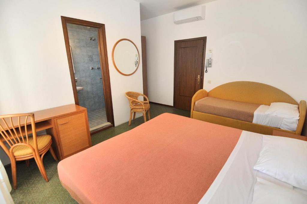 Postel nebo postele na pokoji v ubytování Venus Best Price