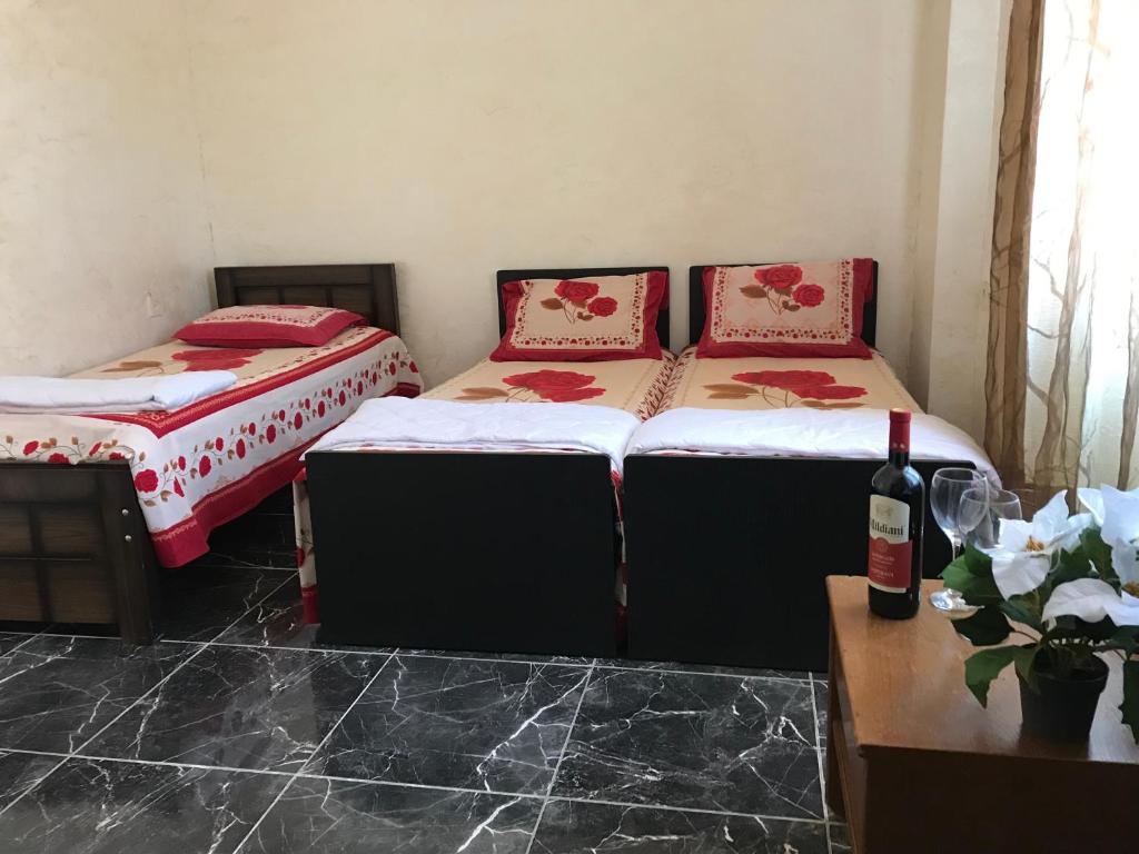 Postel nebo postele na pokoji v ubytování Kobuleti Guest House chexov 24