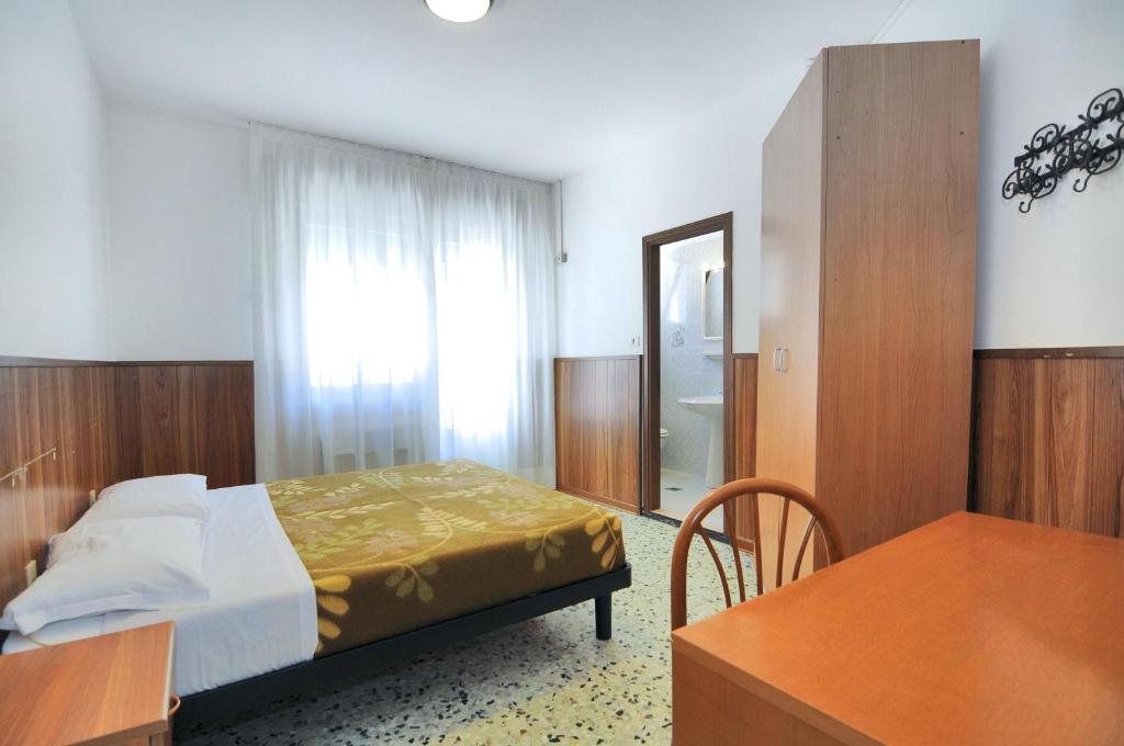 Postel nebo postele na pokoji v ubytování Venus Best Price
