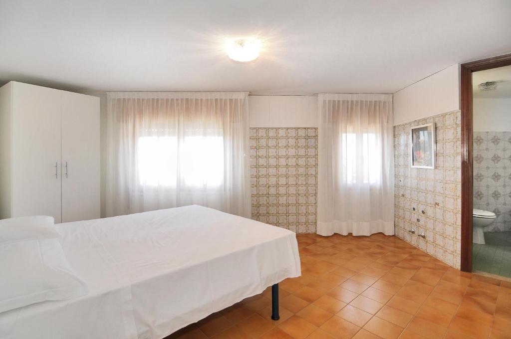 Postel nebo postele na pokoji v ubytování Venus Best Price