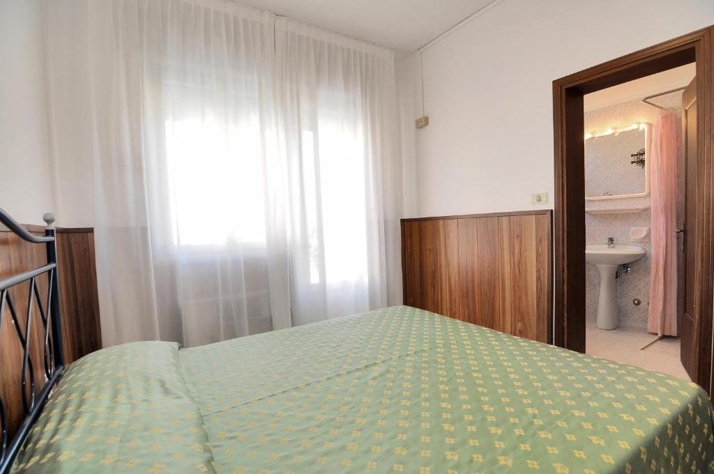 Postel nebo postele na pokoji v ubytování Venus Best Price