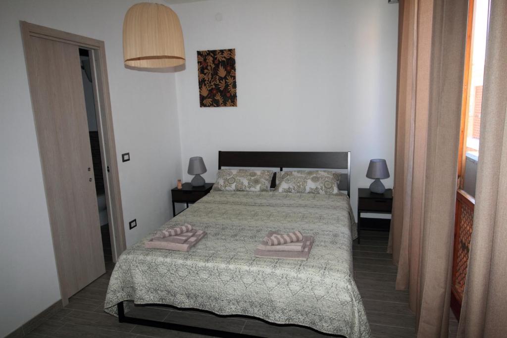 Postel nebo postele na pokoji v ubytování B&B Libellula