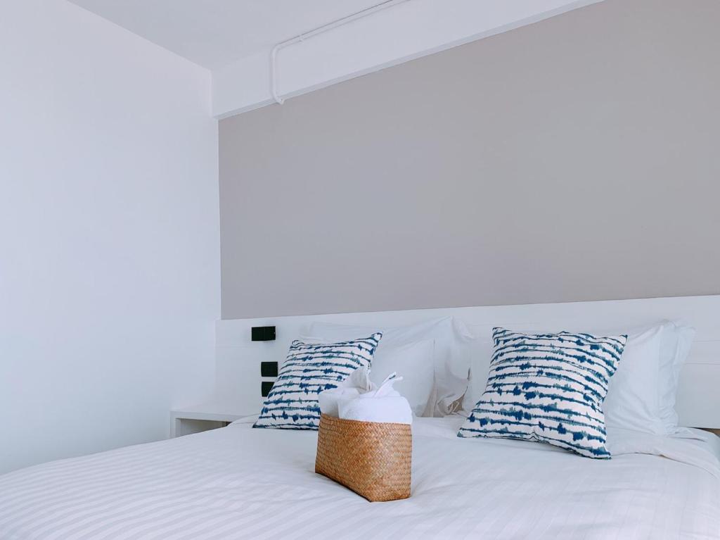Postel nebo postele na pokoji v ubytování Blue Tao Beach Hotel - SHA Plus