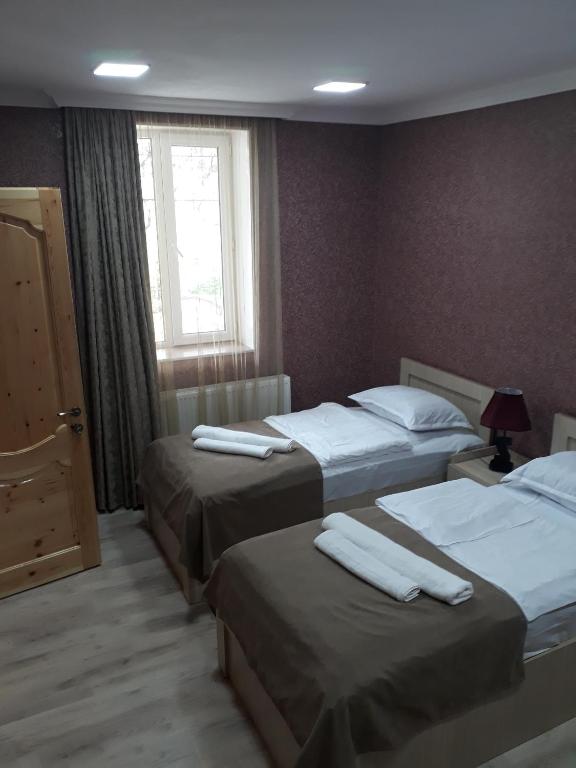 Postel nebo postele na pokoji v ubytování Vardzia in 15