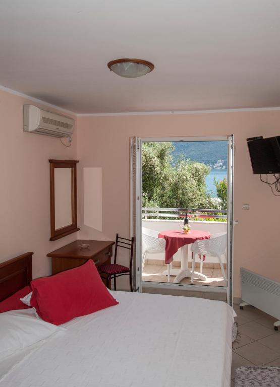 Postel nebo postele na pokoji v ubytování Apartments Mako