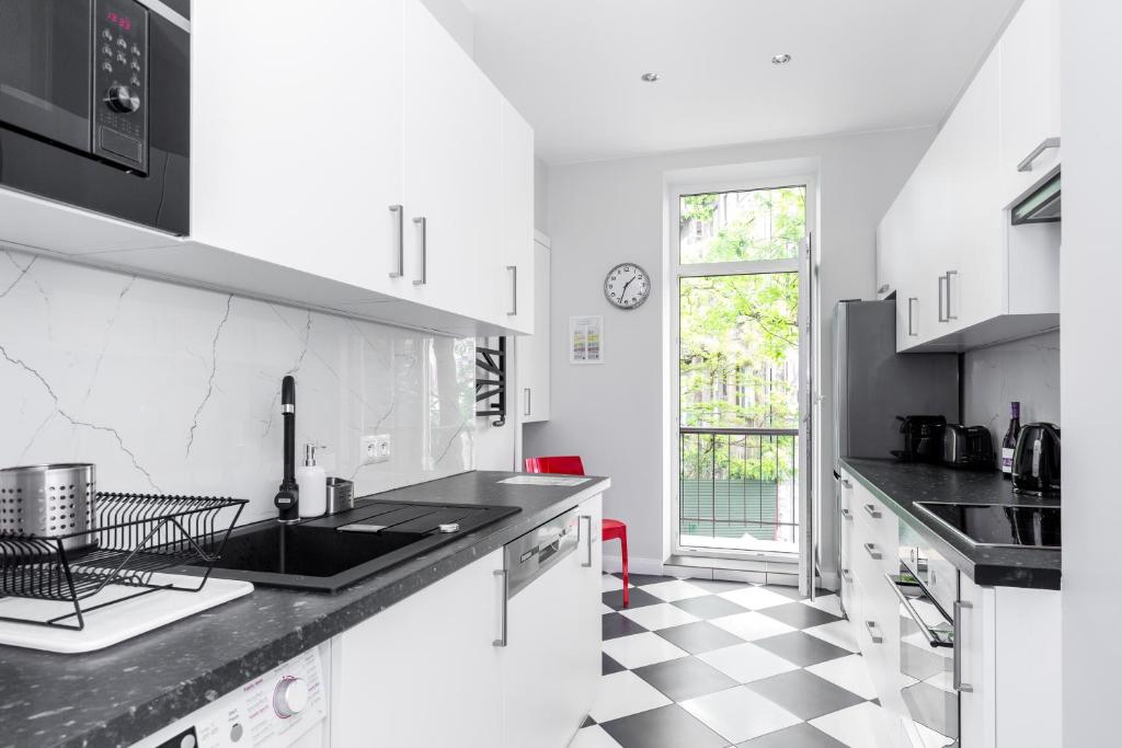 Kuchyňa alebo kuchynka v ubytovaní Luxe Living Krakow