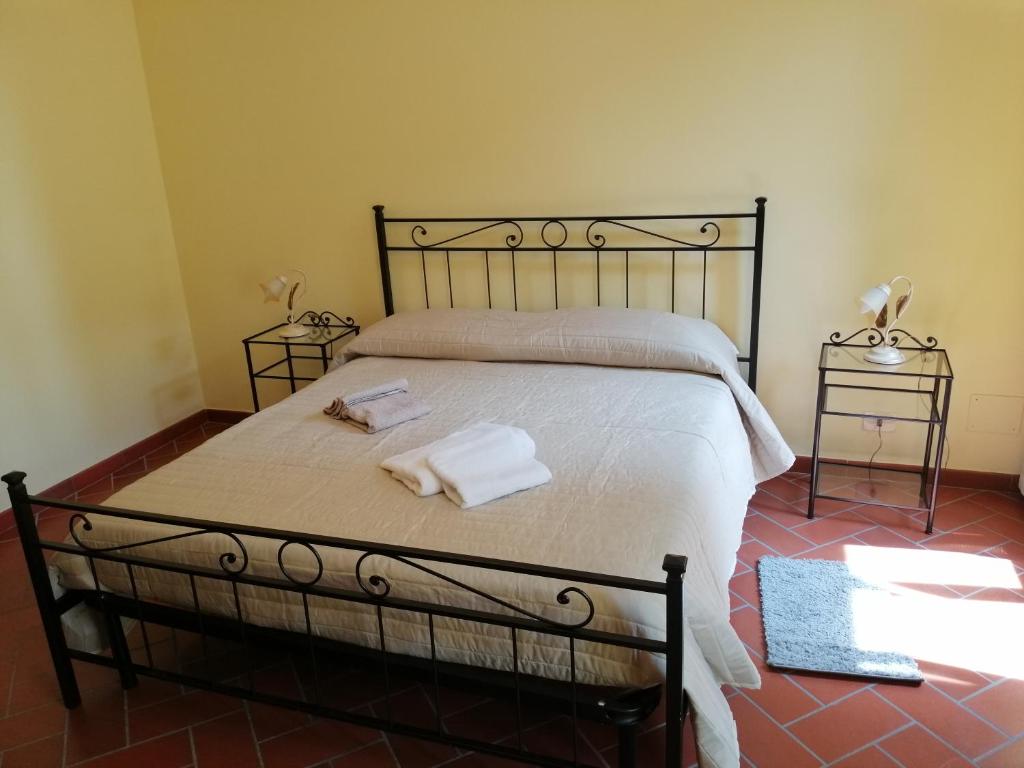 Posteľ alebo postele v izbe v ubytovaní La Casa del Gigli
