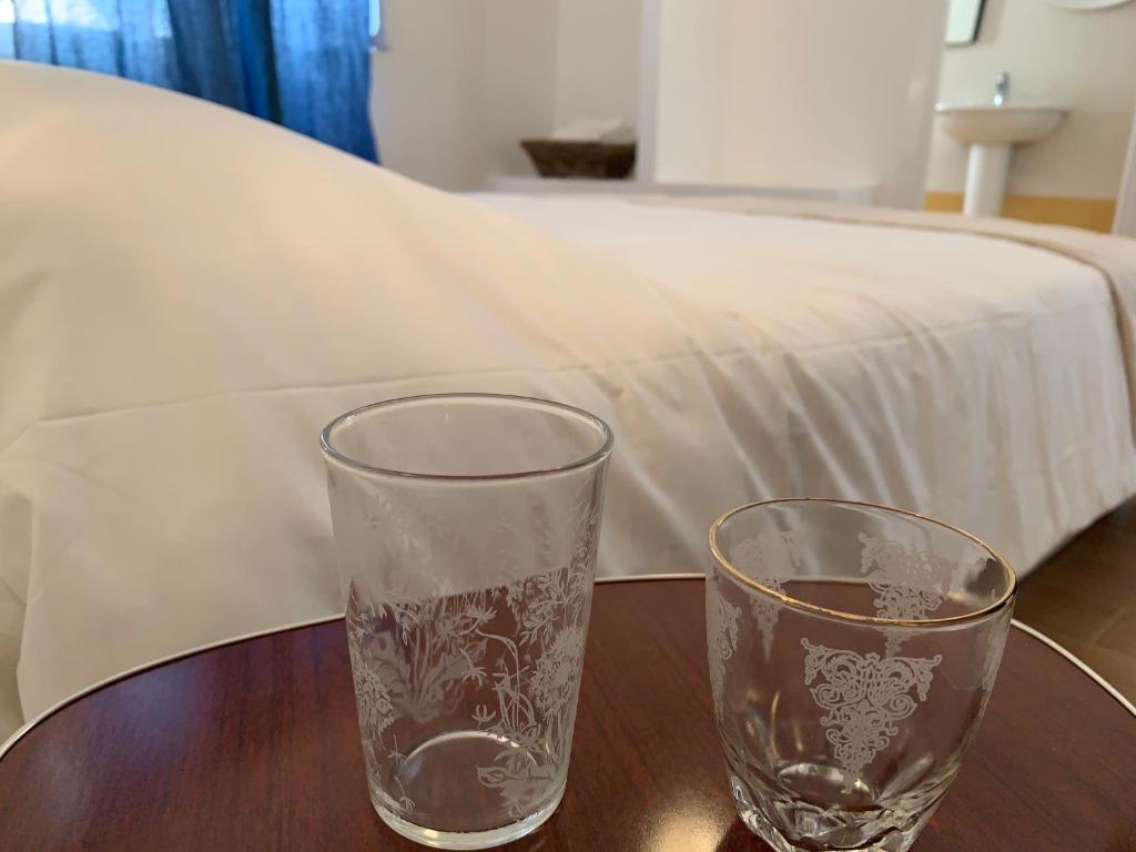 Posteľ alebo postele v izbe v ubytovaní Room En Suite la Corte Assisi