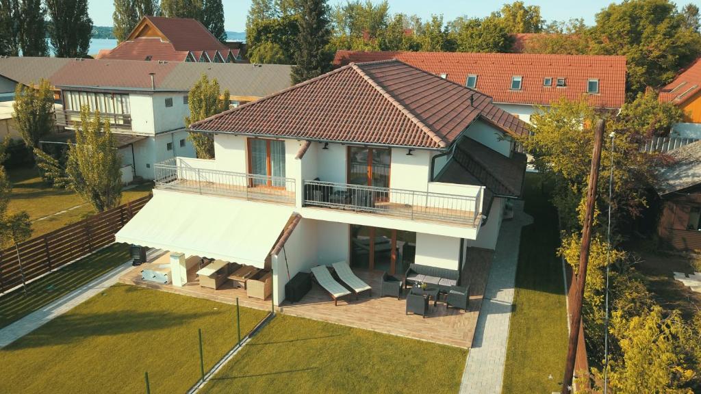 an overhead view of a house with a roof at Beachside Apartment in Szántód