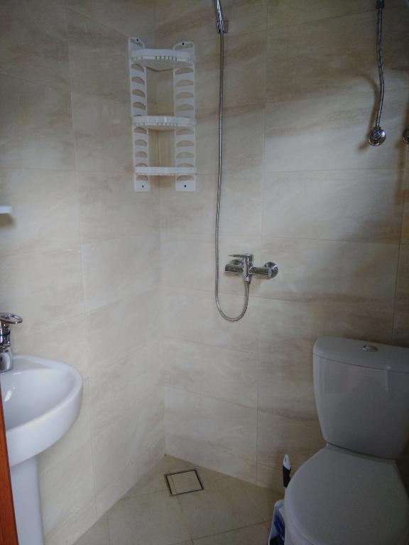 Koupelna v ubytování Mini Hotel Уютный дворик