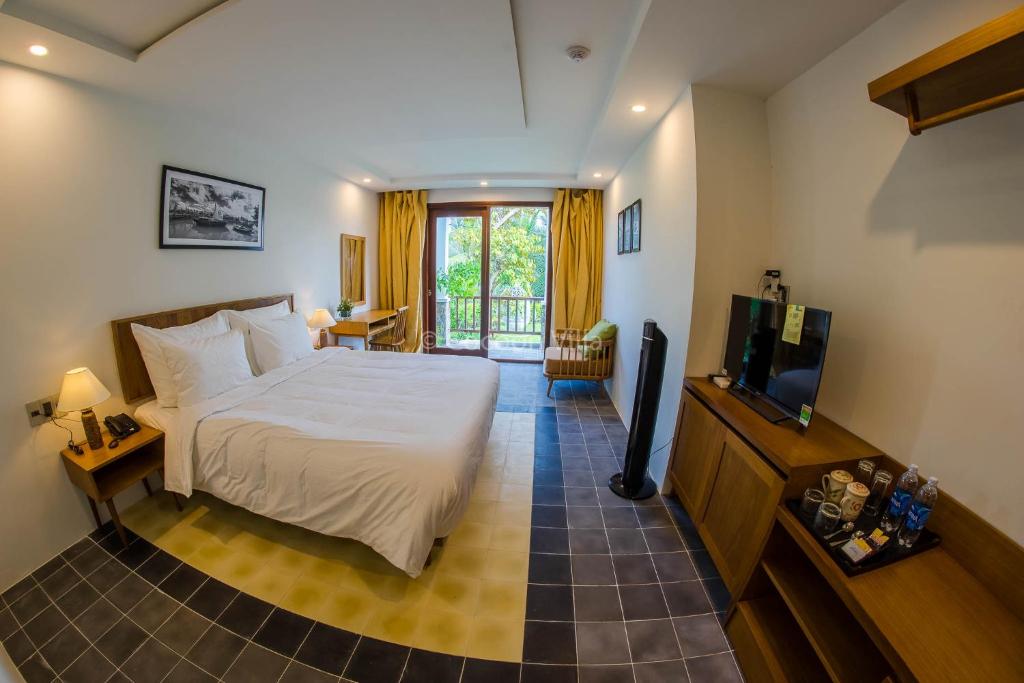 Postel nebo postele na pokoji v ubytování Cocoon Villa