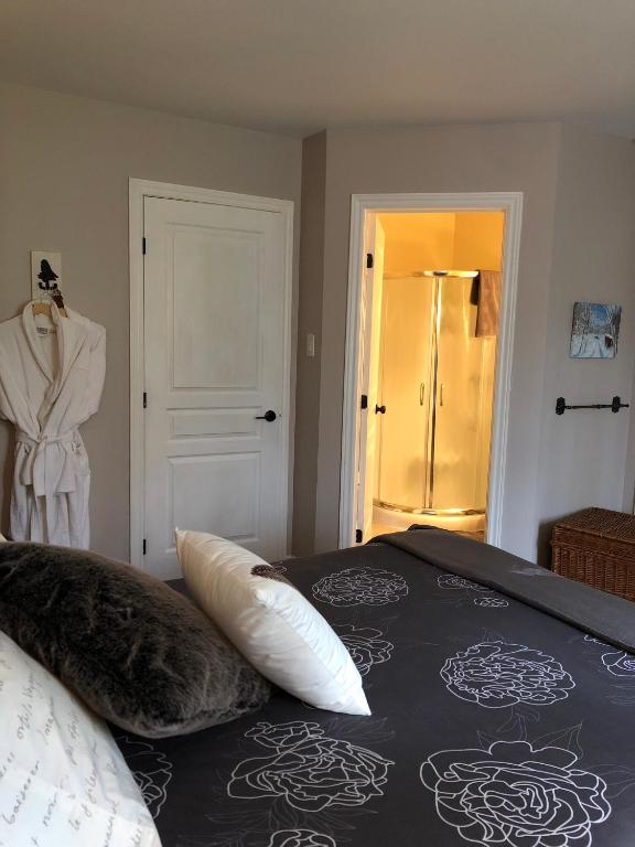 Postel nebo postele na pokoji v ubytování Au Gré Du Temps - Gîte B&B