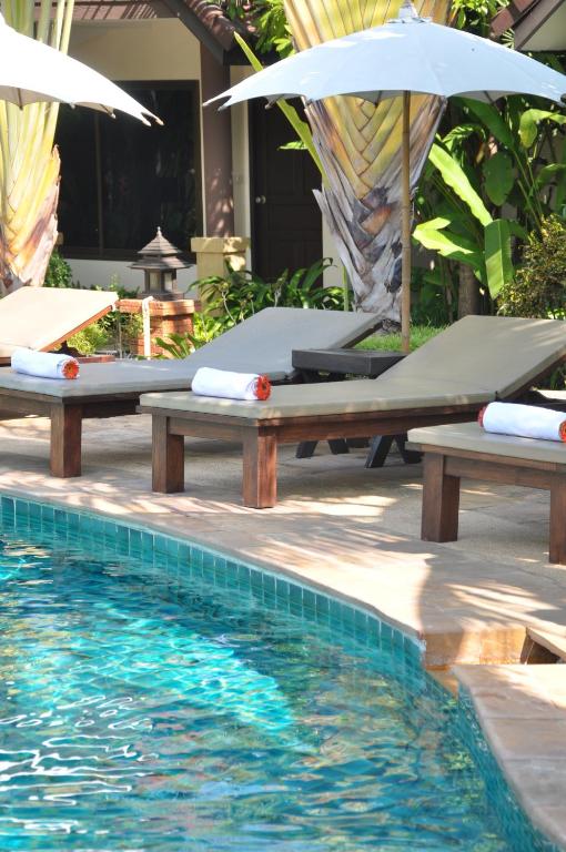 Piscina a Laluna Hotel And Resort, Chiang Rai o a prop