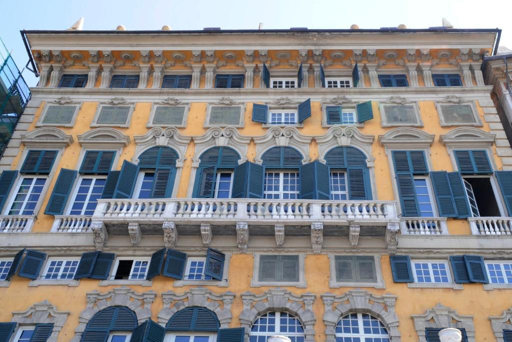 a large building with a large window at La Superba Rooms & Breakfast in Genoa