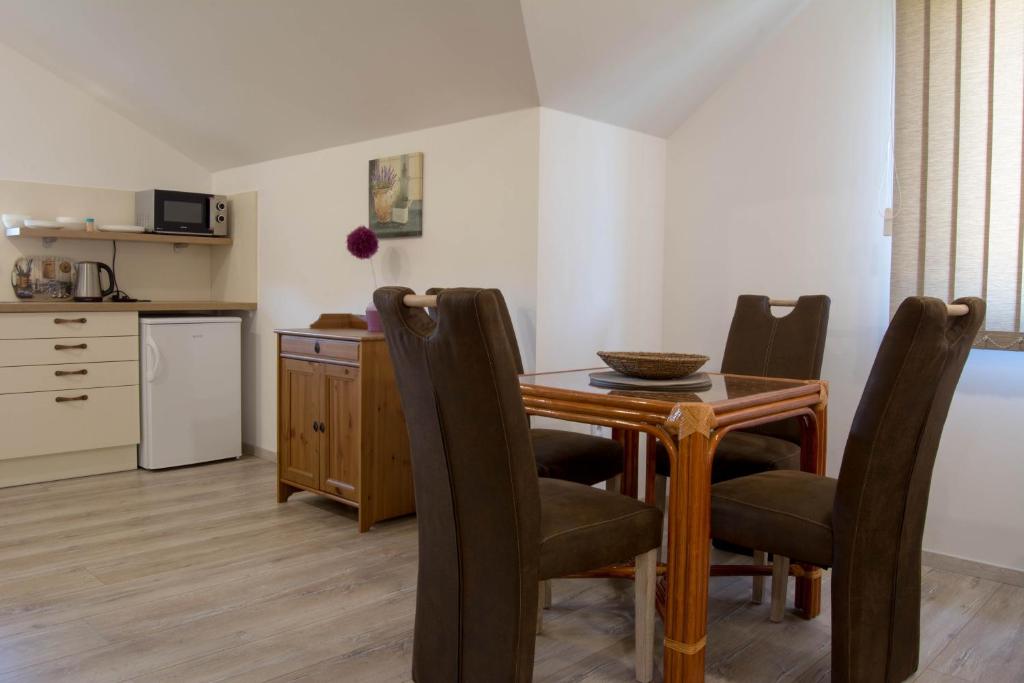 Kuchyň nebo kuchyňský kout v ubytování Apartments Gerda
