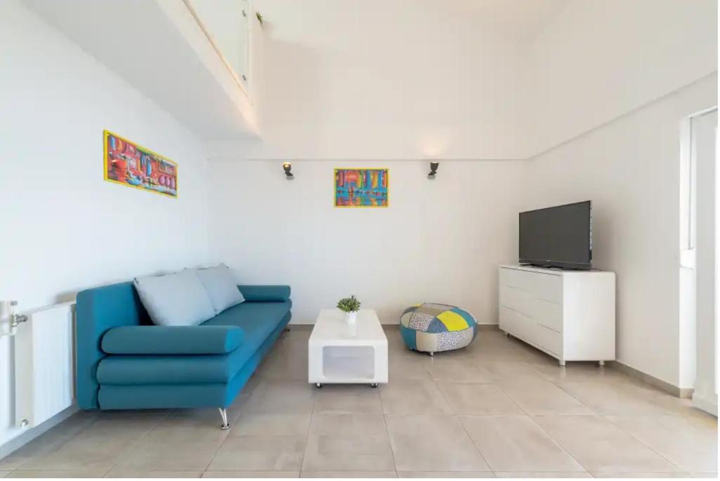 TV a/nebo společenská místnost v ubytování Apartments Mimac