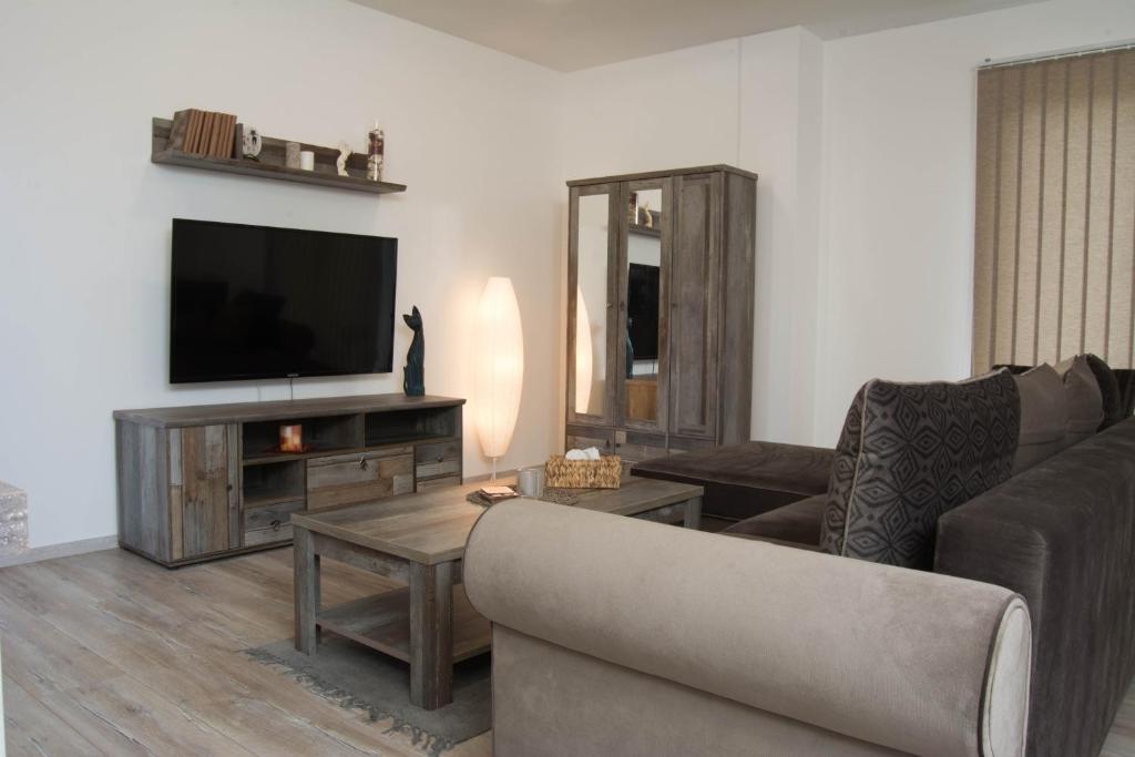 TV a/nebo společenská místnost v ubytování Apartments Gerda