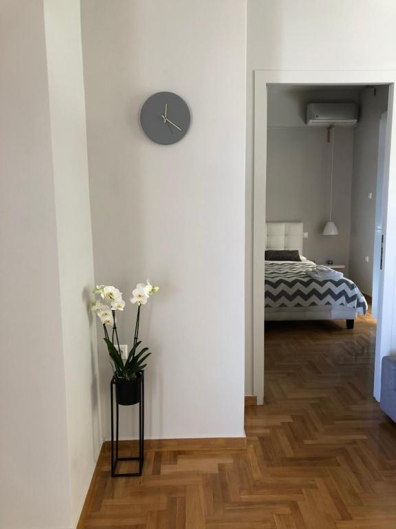 Posteľ alebo postele v izbe v ubytovaní Acropolis View Penthouse N
