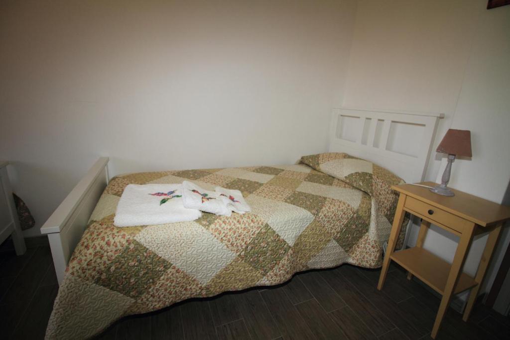 Postel nebo postele na pokoji v ubytování B&B Libellula