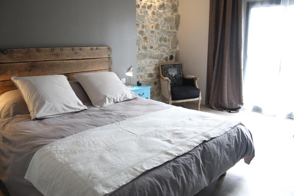 Postel nebo postele na pokoji v ubytování L'Albane Chambres d'hôtes