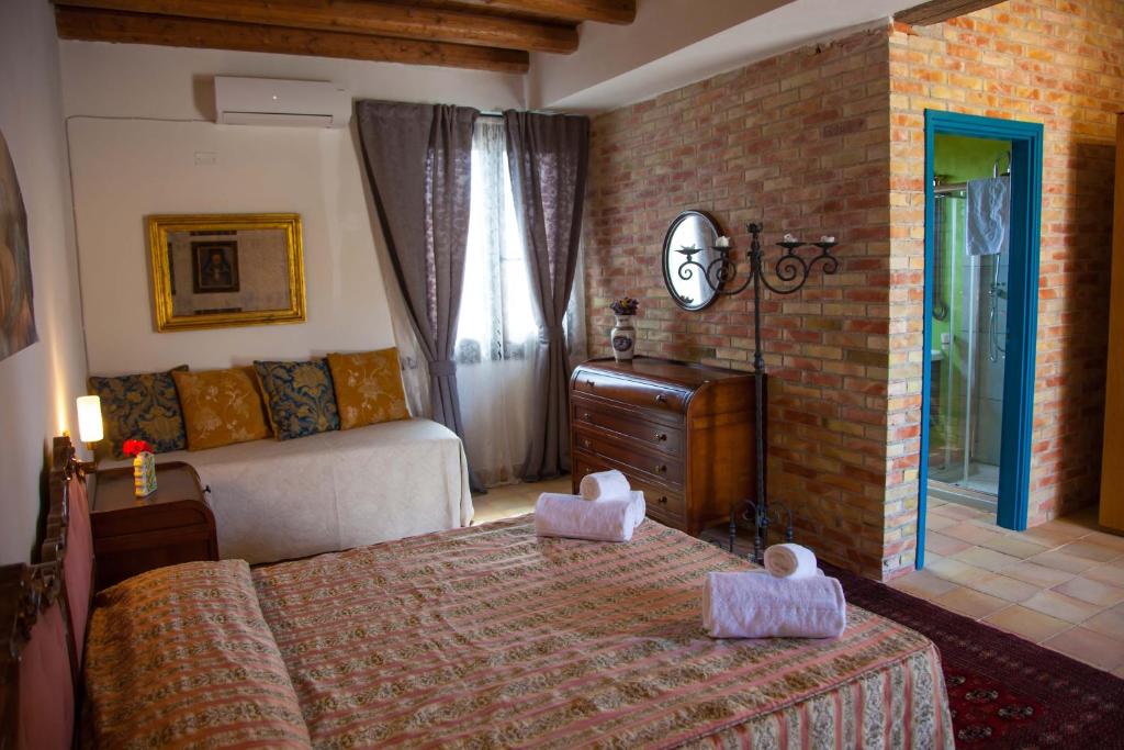 Postel nebo postele na pokoji v ubytování Casa Go'El