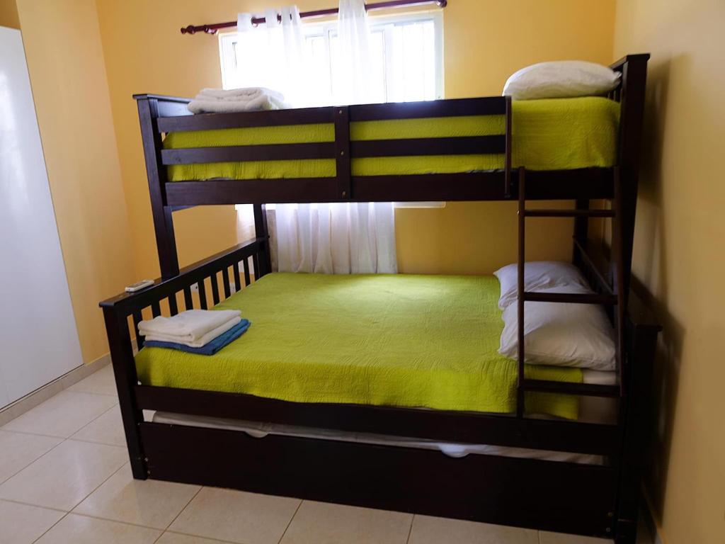 Postel nebo postele na pokoji v ubytování Playa Dorada Mountainview Villa