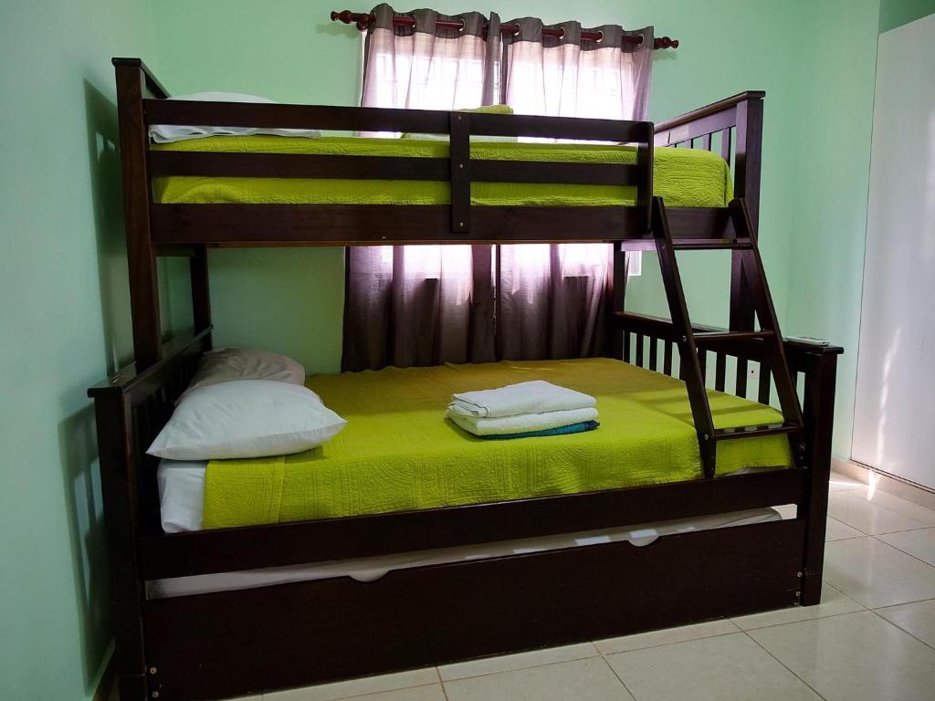 Postel nebo postele na pokoji v ubytování Playa Dorada Mountainview Villa