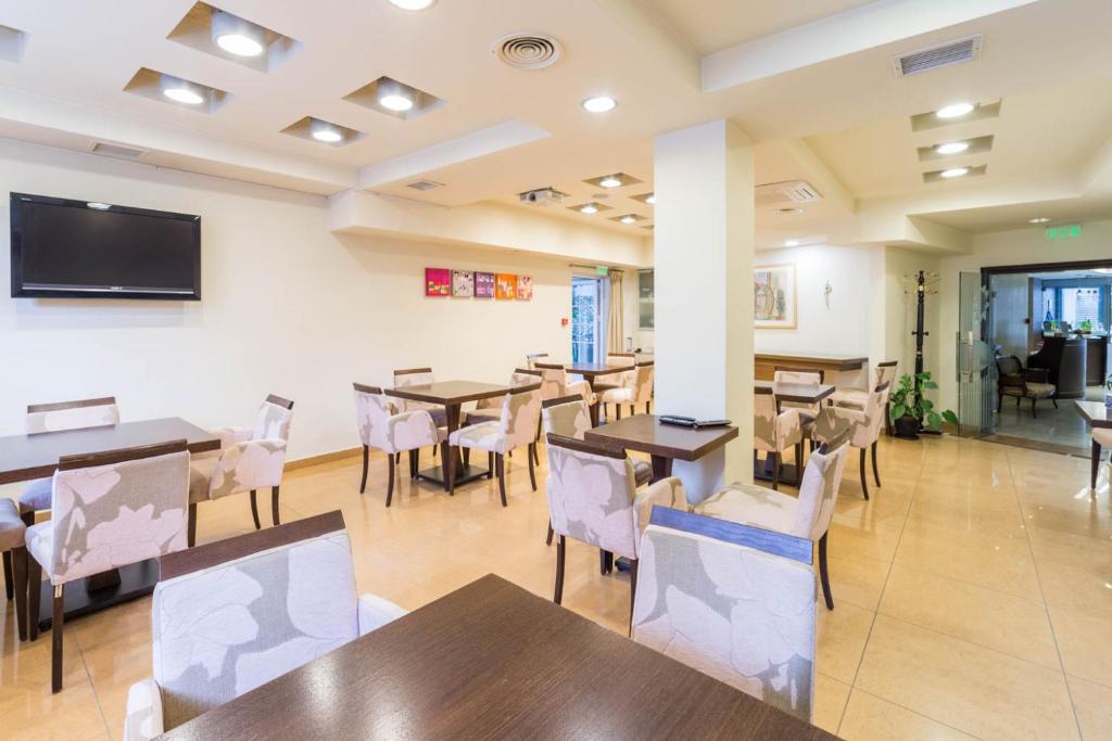 TV a/nebo společenská místnost v ubytování Lido Hotel