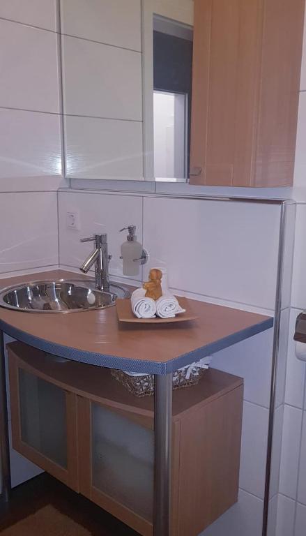 Kuchyň nebo kuchyňský kout v ubytování Ferienwohnung Ostseepalast