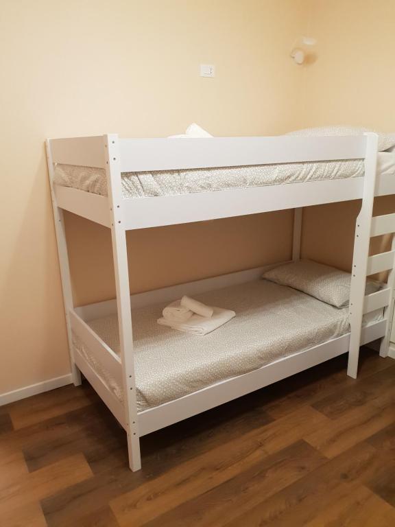 Posteľ alebo postele v izbe v ubytovaní Glam Resort G H O S T E L
