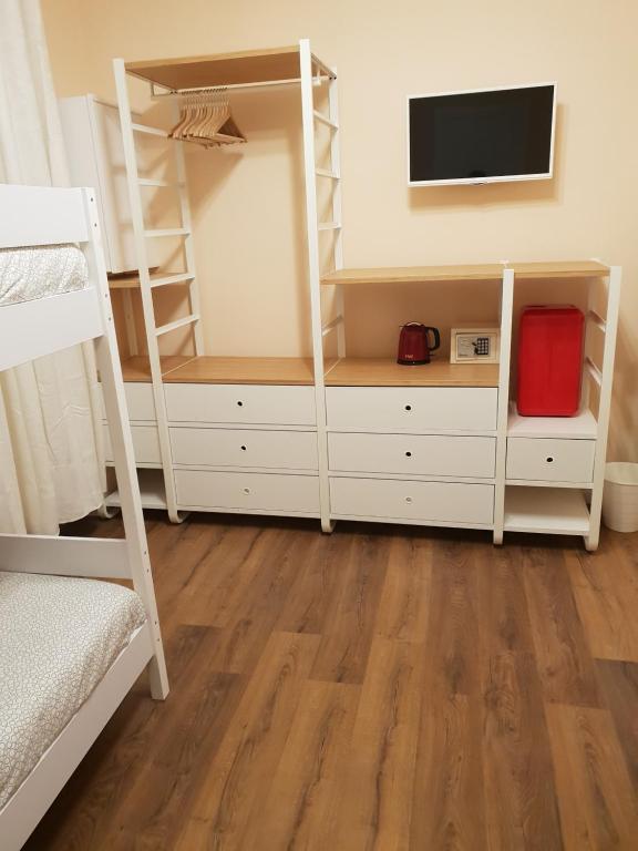 Posteľ alebo postele v izbe v ubytovaní Glam Resort G H O S T E L